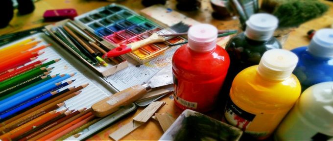 bottles of paints, water colours and paint palette