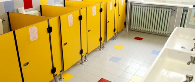 school toilet cubicles with yellow doors