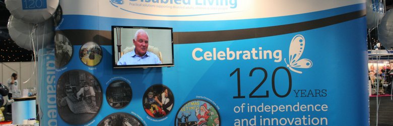 disabled living 120 years stand with tv screen at kidz to adultz north