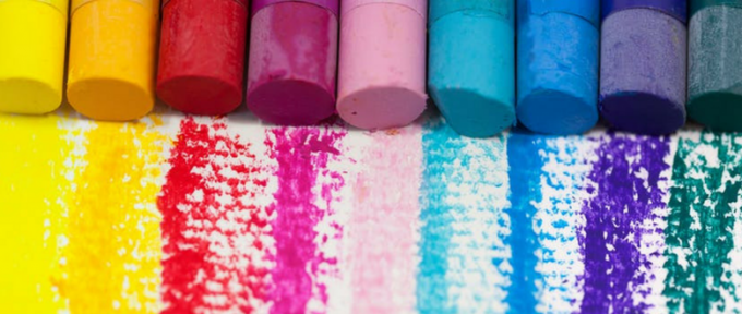 a row of oil pastels in different colours