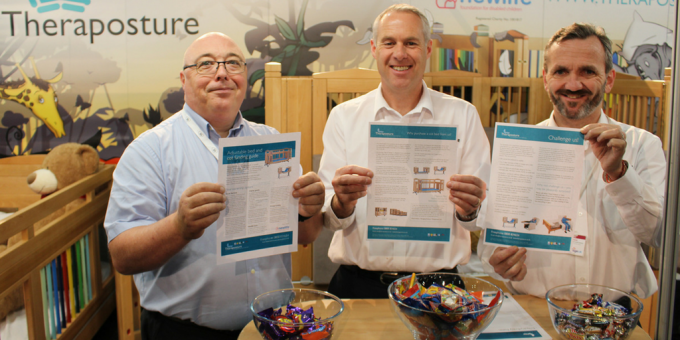 theraposture team holding info flyers