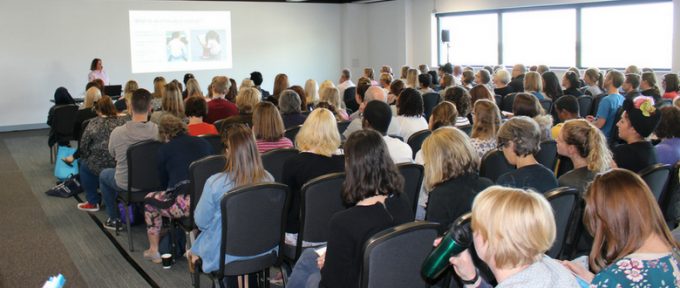 kidz south seminar room full of people