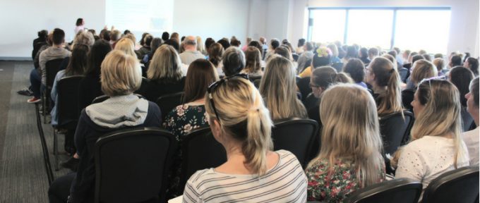 kidz south seminar photo room full of people