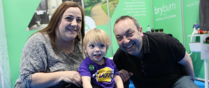 aiden with his mum and dad at kidz to adultz exhibition