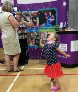 carmela blowing bubbles at kidz exhibition