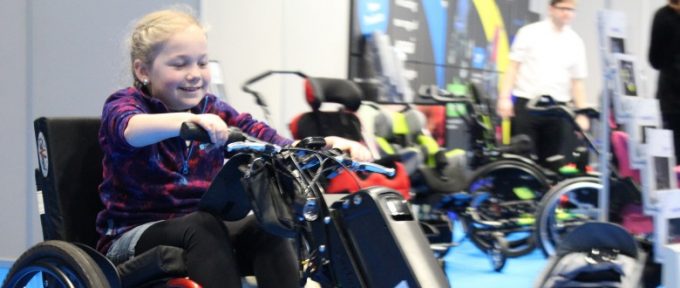 little girl using equipment