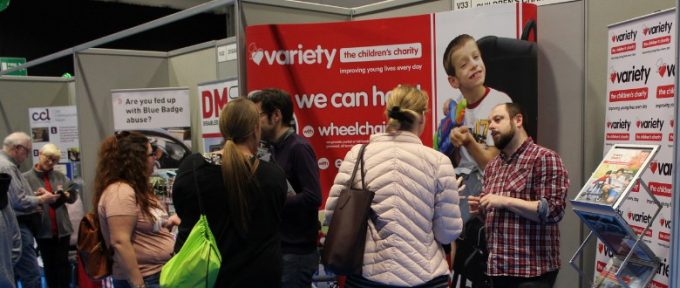 people at variety's stand an the exhibition