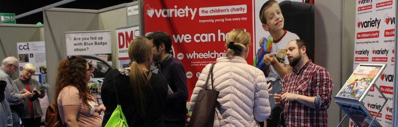 people at variety's stand an the exhibition