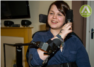 young woman using Armon range of Mobile Arm Supports