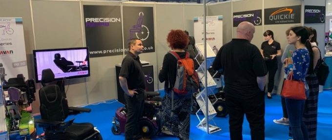 precision rehab reps at their stand
