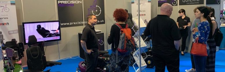 precision rehab reps at their stand
