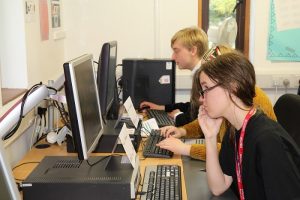 student looking at her computer screen