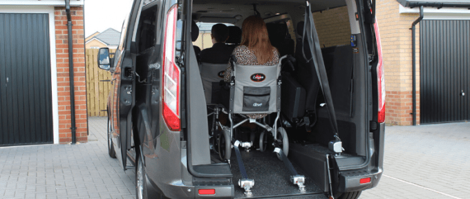 wheelchair user inside mobility vehicle