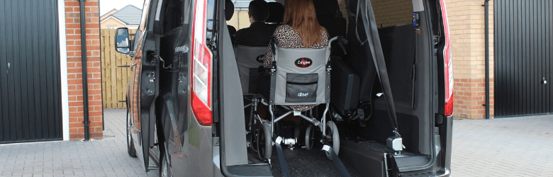 wheelchair user inside mobility vehicle