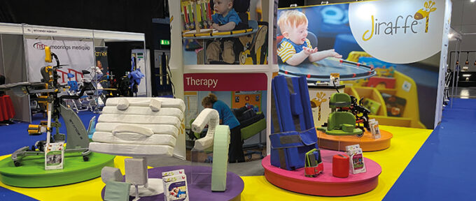 jiraffe stand at a kidz to adultz event