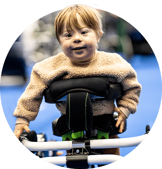 Boy using walking assistive equipment