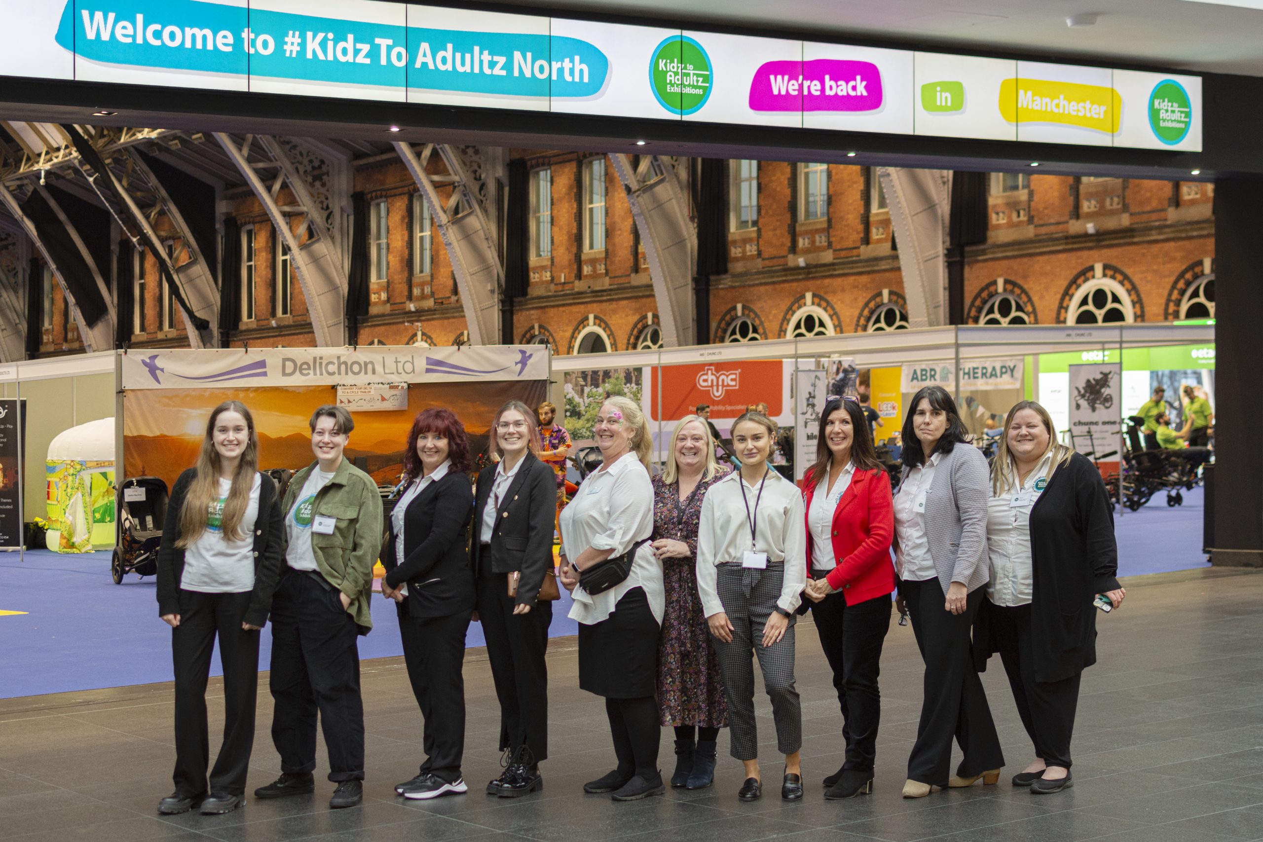 Kidz to Adultz Team photo at the entrance to the North exhibition