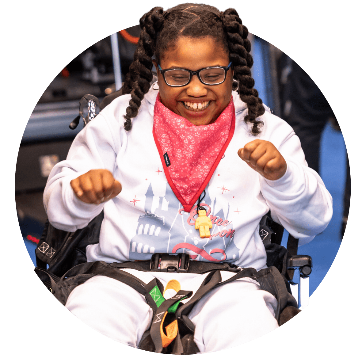 Girl excited to be trying out assistive chair